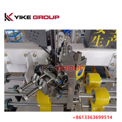 La machine à coudre à la boîte ondulée YK-2000 du groupe YIKE