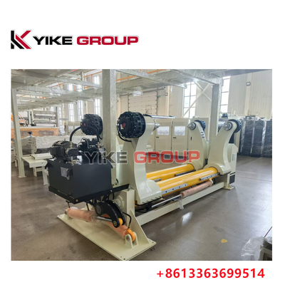 Ligne de production de carton ondulé avec action hydraulique